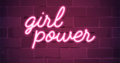 Imagem: fundo de tijolos com letreiro neon escrito "girl power". mulheres.